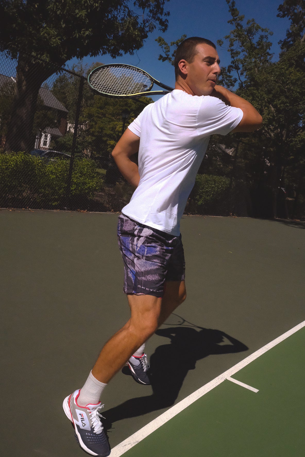 DISTRESSED PERFORMANCE SHORTS